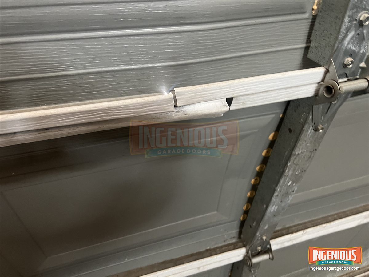 Inside view of the top section. The strut and the panel folded where the opener pulls.