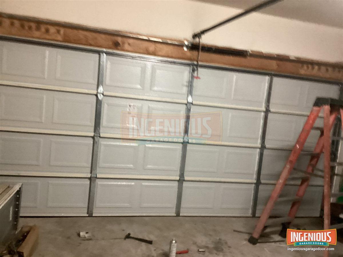 The new door going in, seen from inside the garage.